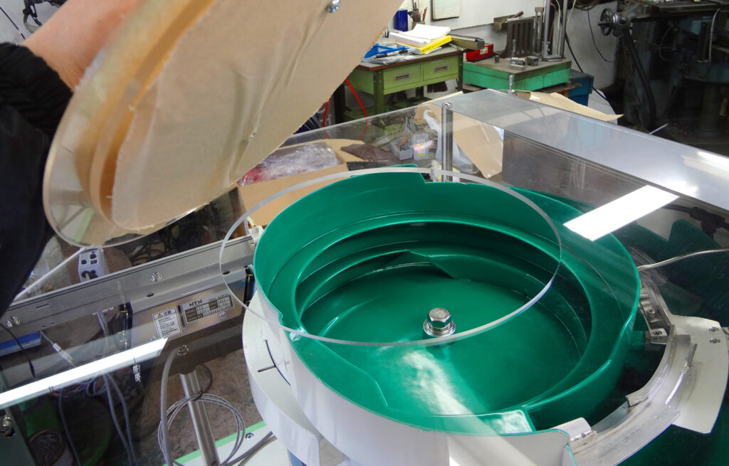 シリンジバックストップ整列機