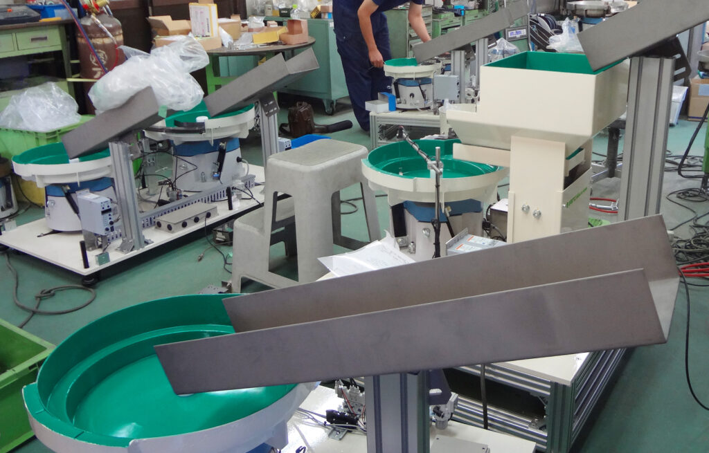 ブッシュ＆ナット整列機