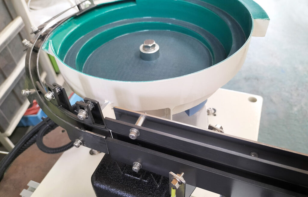 ワッシャー付き六角ボルト整列機