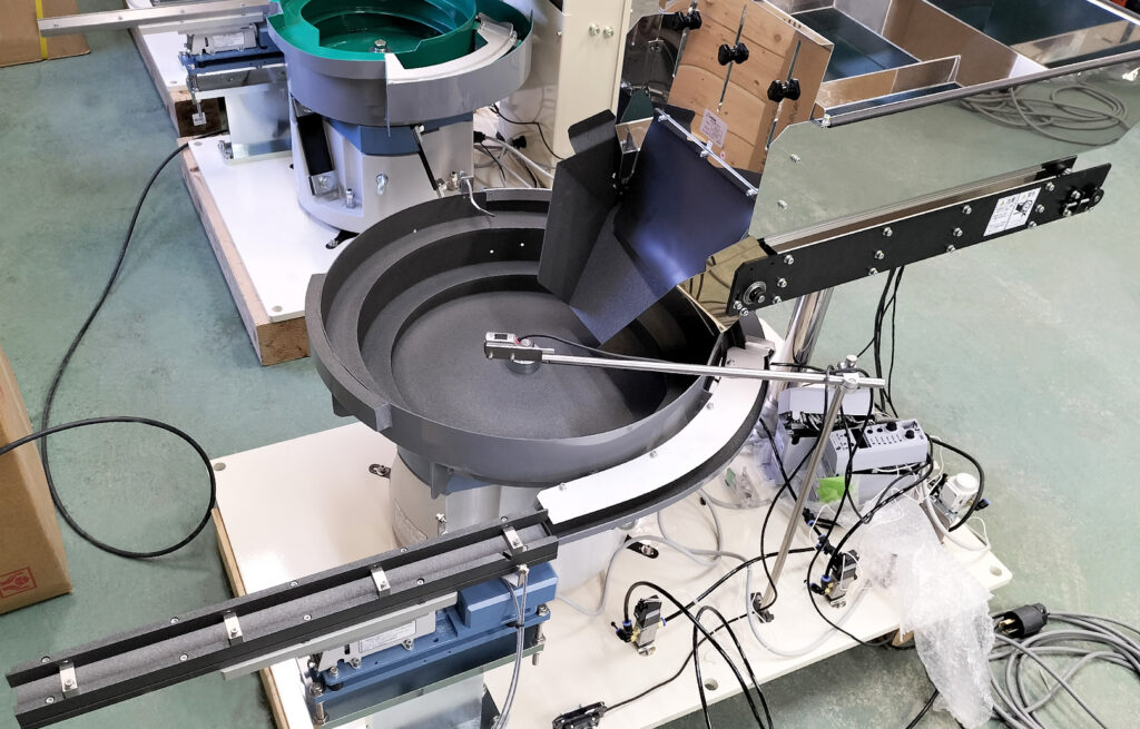 ゴム栓(ゴムパッキン)整列機