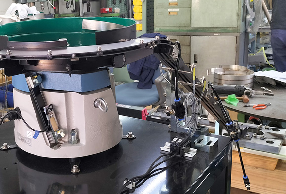 リング状金属部品整列機